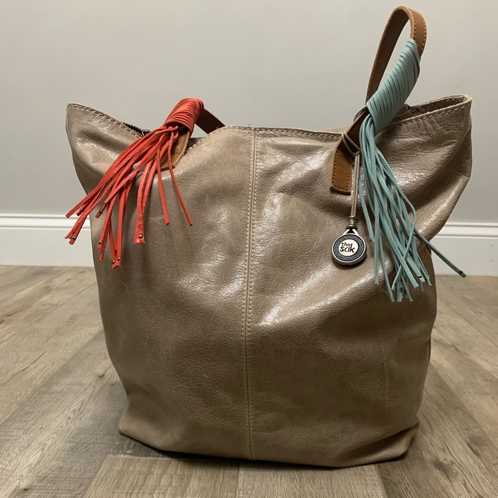 The Sak Leather Handbag Turquoise Red Tassels Bucket Bag nwot!